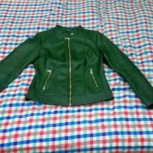 A dark green leather coat. it a size small in general.